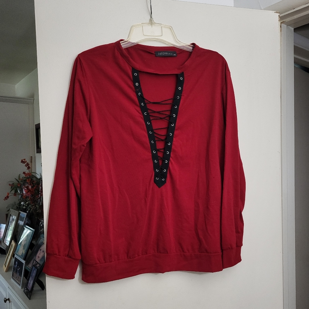 Deep red long sleeve shirt with sexy lace-up feature.